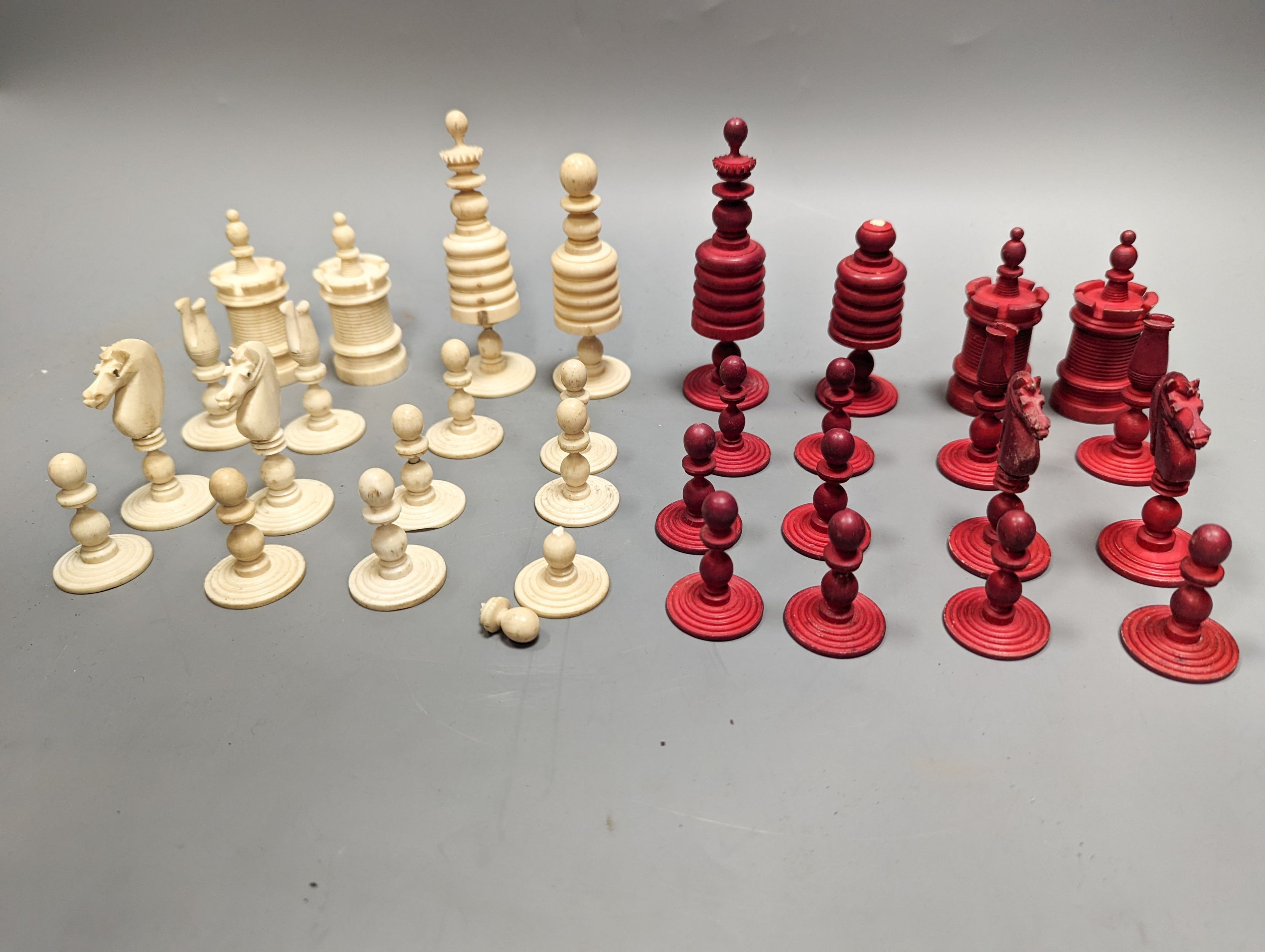 A 19th century turned ivory and bone chess set